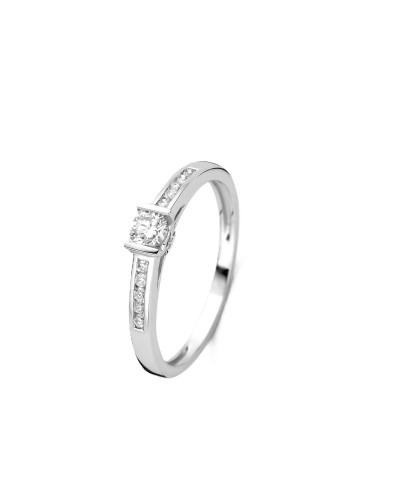 Solitaire accompagné serti barrette. Diamants FVS