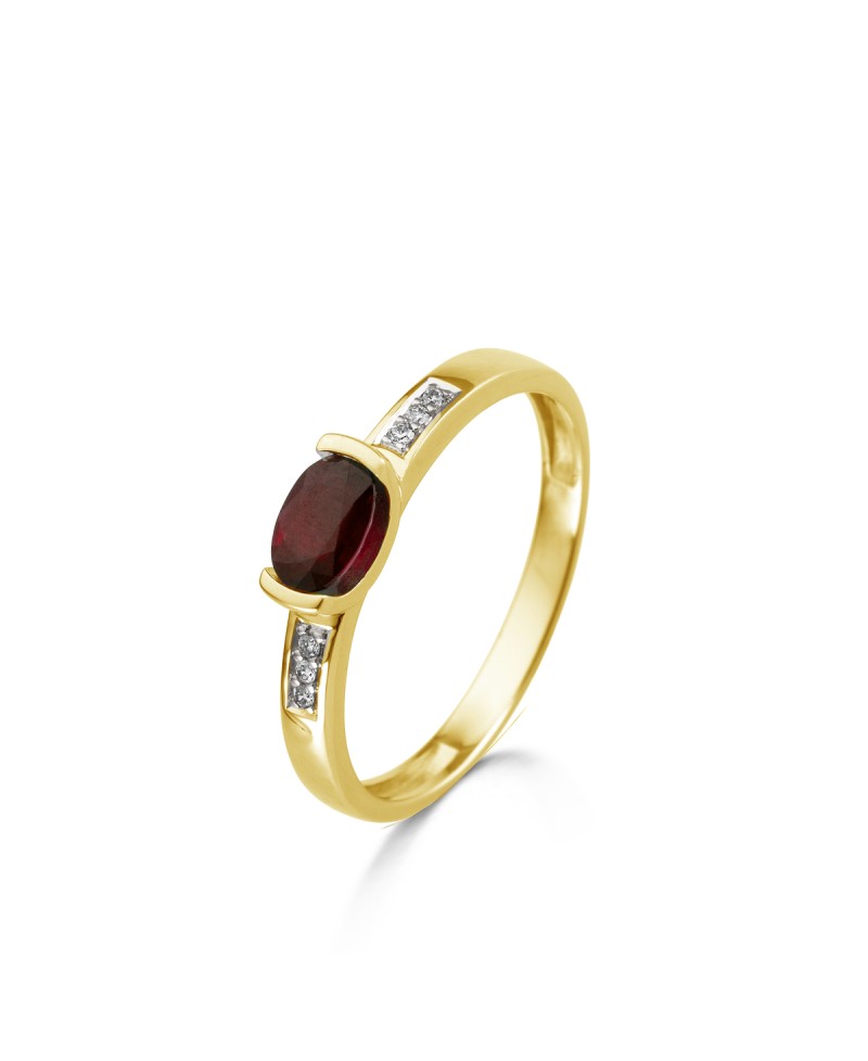 Bague Rubis accompagnée serti rail